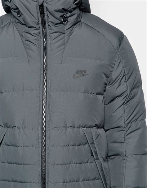 Nike – AV15 – Kapuzenjacke in Grau, 806855–021 